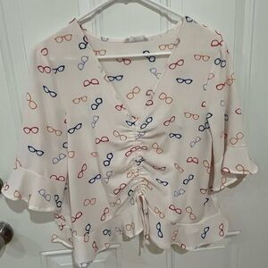 Elodie Cream Blouse with Flutter Sleeves and Ruffled Tie Front